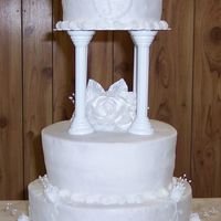 White Wedding Cake I sprayed this white cake with pearl spray for a shine...