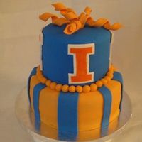U Of Illinois Birthday Cake Birthday cake for a U of I ulumni. Decorations are made of fondant and gumpaste. TFL!