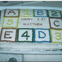 Block Birthday Cake This one I did for my first child's first birthday, we had a large party so I did a big sheet cake.