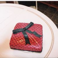 Red Gift This is a cake i did for my sister's bridal shower last month, she loved it. Her colors were a claret red and black, the red didn'...