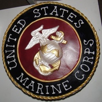 Usmc Logo Fondant EGA, rope trim, and top. All colored using airbrush with Americolor food coloring.Made for my Godmother who retired after 30 years...