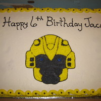 Bumblebee Transformers Cake 1/2 sheet cake with buttercream. I used piping gel to transfer image to the cake.