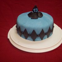 Blue Diamond 9 in covered in fondant. I used a cookie cutter to make diamonds.