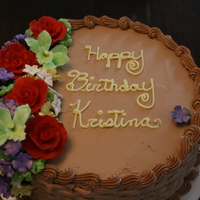 Gumpaste Flowers gumpaste flowers airbrushed different colors for a birthday cake.