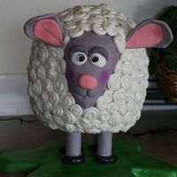 Baah Baah! Sheep! Fun cake to put together! Weighs a LOT when done :) Decorating took about 5 hours the first time.