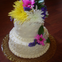 Small Backyard Wedding A small cake for a backyard country wedding. 1 layer Chocolate zuchini cake & 1 layer french vanilla with raspberry filling. Fresh...