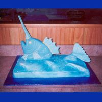 Sailing Swordfish This cake was designed for a deep sea fisherman's surprise birthday party. The head of the fish is half of a fondant covered fish pan...
