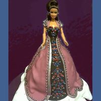 Bob Mackie Barbie this cake was designed for my friends b-day, (50-something), i guess your never too old for a new barbie huh? she collects many of them,...