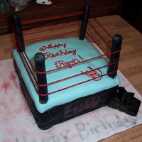 Wrestling Cake This is my wrestling cake I did for my son. If was a battle to get done because my fondant would not work with me. Thanks for looking