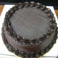 My Yummy Moist Chocolate Cake.. 1St Chocolate Decoration This is my 1st chocolate decoration cake.. previously my chocolate cake is very plain and only coat with ganache without any border and no...
