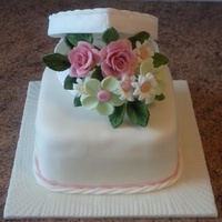 Box And Flowers vanilla sponge covered with fondant. Flowers are flowerpaste wired into a spray (second time I've ever done this and there were a few...