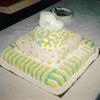 Baby Shower W/bootie Tierd cake w/ baby bootie on top