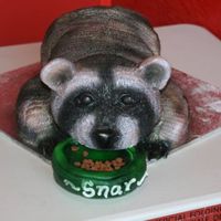 Snar The Raccoon This is a fondant covered cake, all hand carved, and painted by hand and with the air brush. Lots of fun to make