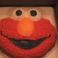 Elmo Face Used wrapping paper and did not think to cover it with clear paper. I will cover it for now on.