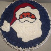 Santa Claus Cake Devils food cake with cherry filling. buttercream icing.