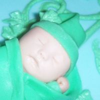 Baby Face Hand molded w/MMF and gumpaste.