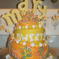 Topsey Turvey Sweet 16 Butter cream covered with fondant. buttercream/cream cheese frosting piped details. fondant flowers on curled wire.