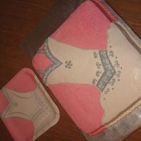 Wedding Dress My friend wanted a cake to match her plates. It was difficult because I am not a free hand artist at all!! She was happy with the results...