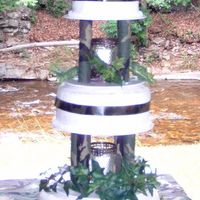 Camouflage Wedding Cake This is a 12-9-6 tier camouflage theme wedding cake. The cakes are decorated all in white buttercream smoothed to look like faux fondant...