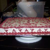 100_1985.jpg Half chocolate/half yellow cake with BC icing..