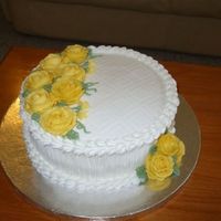 Yellow Rose Cake I made this cake yesterday for my husband and his co-workers, but I thought it looked so much like a Mother's Day cake that I decided...
