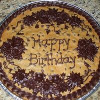 Giant Cookie Cake Cookie cake for my sweet, sweet husband's birthday! I know it may seem a little feminine with all the flowers, but he requested a lot...
