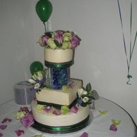 The $100 Wedding Cake I did this cake for a bride and groom on a very small budget. WASC cake with SMBC and raspberry filling. The seperator was made by groom.