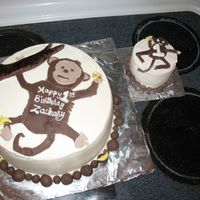 Monkey Around This is a 10" round for a friend's son's 1st birthday. I copied the silly looking monkey on his invite. TFL