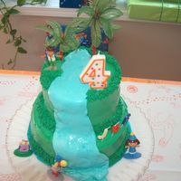 Diego Birthday Cake This cake is a 2 tier yellow 6 inch cake and a 2 tier chocolate 8 inch cake with a chocolate mousse filling in both layers. I used MMF for...