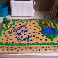 Jungle Theme OK here is the whole picture. Sheet cake BC icing. Leopard skin background done with clear gel tinted with orange & brown for center...