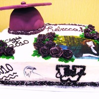 Graduation Cake Hi this is a double layer 1/2 sheet cake, 1/2 white, 1/2 chocolate. Cake is buttercream except for the graduation cap, which is covered in...