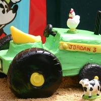Tractor Cake Finally did it, was actually pretty easy though didn't plan on the hot day and the long drive (the small tire fell off (that's...