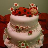 Lady Bug Baby An inspiration made of gum paste and fondant for a delicate and precious details.