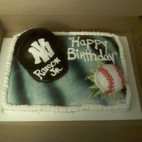 New York Yankee White cake with fondant. Cap make of cake and fondant. With Butter cream frosting