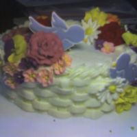 Wilton Ii Since the basketweave was decent on the bottom of the cake, I didn't add a border at the bottom. My first royal icing flowers! I'...