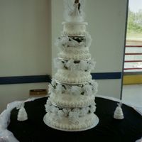 Black And White Wedding My first wedding cake. I was scared silly that the cake would fall, it didn't but I was glad when it was disassembled for cutting!