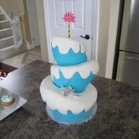 Horton Hears A Who Dr. Seuss Cake - 1St Birthday Horton Hears a Who Dr. Seuss Cake - 1st BirthdayGumpaste flower with Whoville speck. Gumpaste Horton. Blue buttercream.