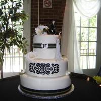 Black And White With Callas Black and white with gumpaste calla lilies,hydrangeas a spider mum and a black royal icing stencil