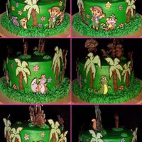 Dora Cake Made for a little girls 3rd bday party! 2 layer cake. Both torted and stacked. Iced all in BC with BC leaves & grass. All characters,...