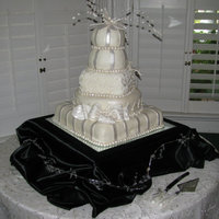 Lori And Ken's Cake White Chocolate pound with buttercream and fondant, gumpaste decorations