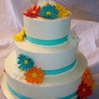Gerbera Daisy Wedding Gumpaste Gerbera daisies with Swiss Meringue buttercream. Cake flavors are marble cake with raspberry, lemon cake with lemon curd filling,...