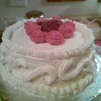 More Roses Practice I used WBH frosting. I love how it tastes, but I almost cried trying to get it smooth. I'm going to keep practicing and follow tips...