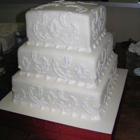 Damask Wedding Cake A Wendy Kromer for Martha Stewart wedding cake design. Mine is white royal icing damask on fondant. Lemon cake with lemon buttercream...