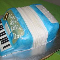 80Th Bday Accordian Cake Carrot cake with cream cheese filling. I was wondering why i thought it would be easy enough to make this cake! Ugghhh! Alot of work. But...