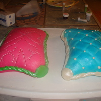 Princess Pillows MAde these for my Best friends bdays that are only a day apart. I was my very first time carving cake, my first time using fondant, and my...