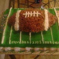 Super_Bowl_Cake.jpg super bowl cake with a rice crispy football on top