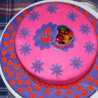 Birght Pink Cake This was the final for the fondant and gum paste course.