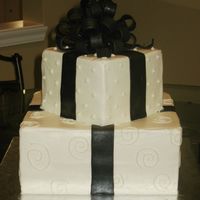 Presents BC with fondant bow and ribbon. I painted the fondant with luster dust. This was based on a cake from this site.