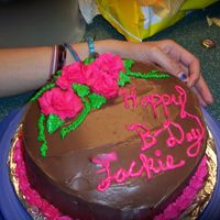 Picture_073.jpg another birthday cake i made for a friend i made it in kind of a hurry but it turned out ok,and someone smudged the J b4 i took the picture...