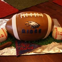 Football Cake Choc cake, covered in MMF.